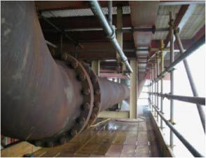 Hot pipework suffering from extensive corrosion under insulation (CUI) offshore