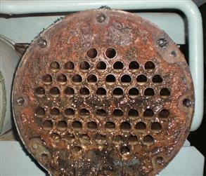 Heat exchanger flange face and tube sheet suffering from galvanic corrosion