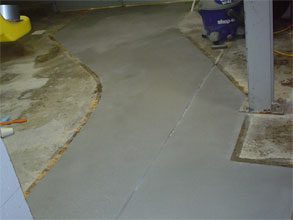 Two coats of Belzona 4151 (Magma-Quartz Resin) with a colored aggregate applied